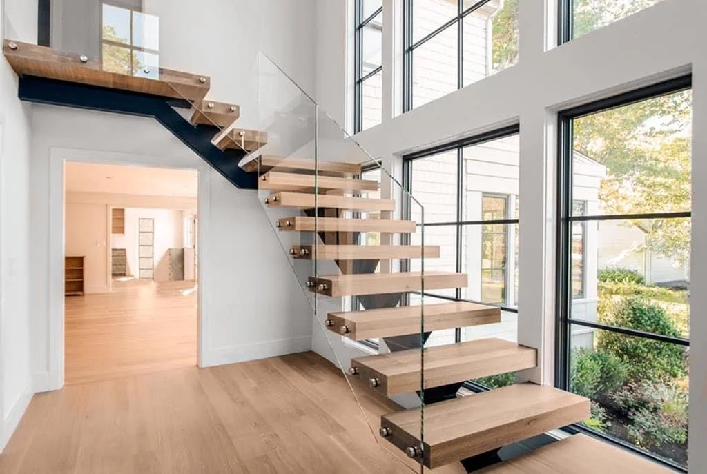 Interior stair with clear glass railing panels